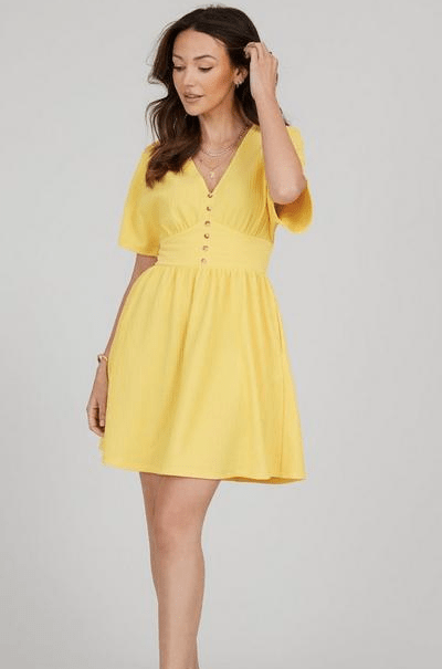 This sunshine yellow dress is the perfect summer dress for the summer