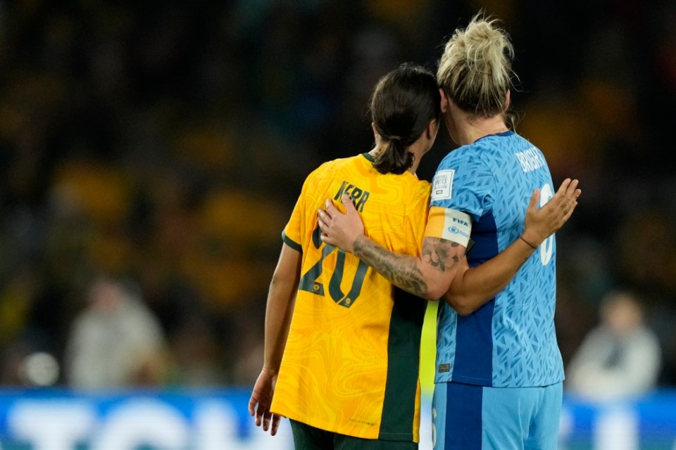 Kerr and Bright embraced on and off the pitch after the final whistle