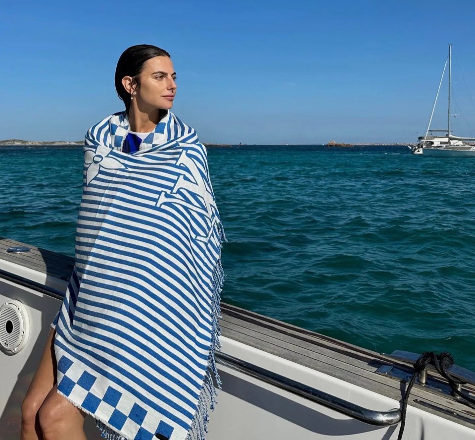 She was also snapped on the boat looking out at the beautiful blue sea