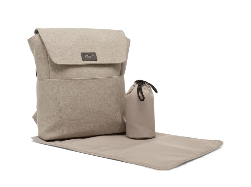 Beige diaper bag, bottle bag, and changing mat.