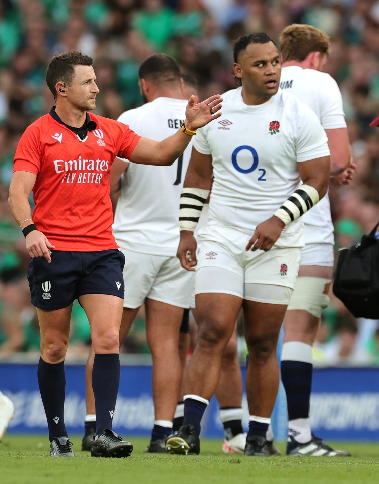 Billy Vunipola of England looks on before being shown the yellow card by referee, Paul Williams which was later upgraded to red