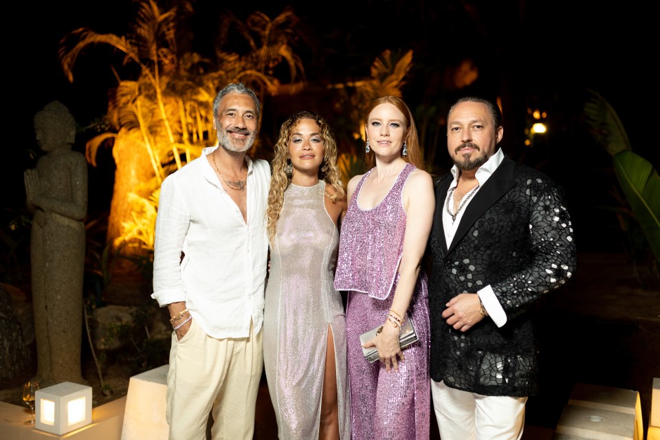 Rita cuddled up to husband Taika Waititi, far left, and posed with film investor Klemens Hallmann and his wife Barbara Meier