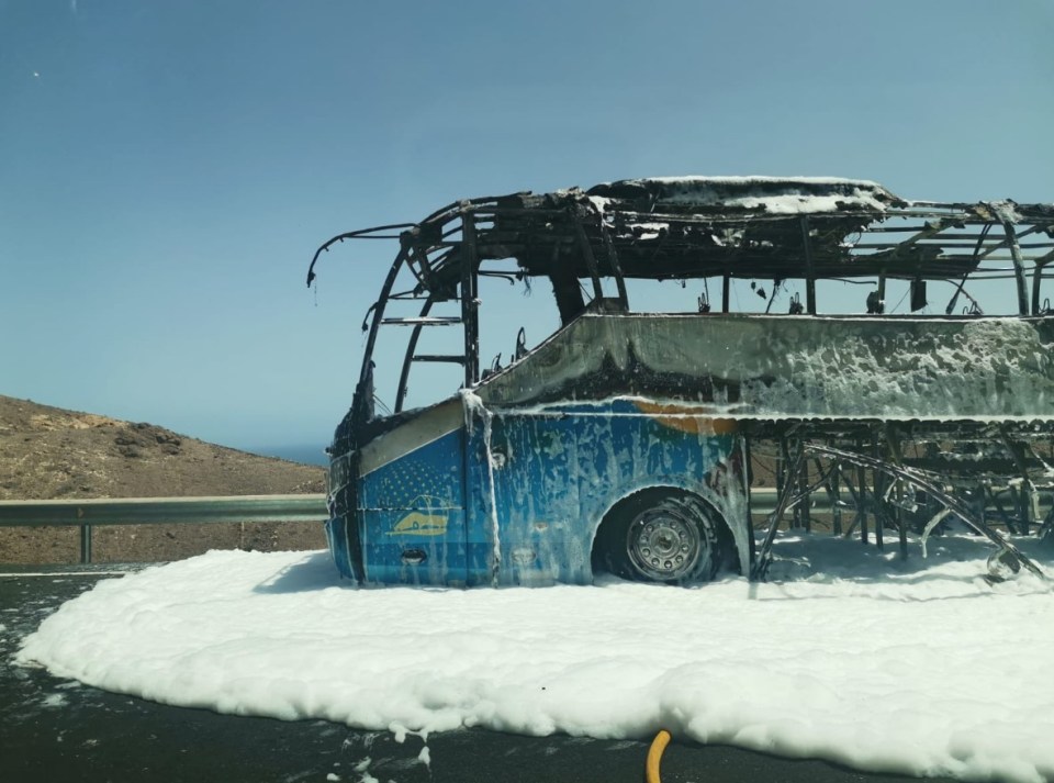 The wreckage of the bus in the aftermath of the fire