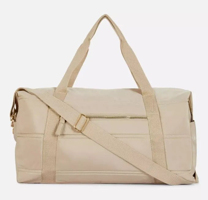 The duffel bag says you are very chic, practical and like to be organised