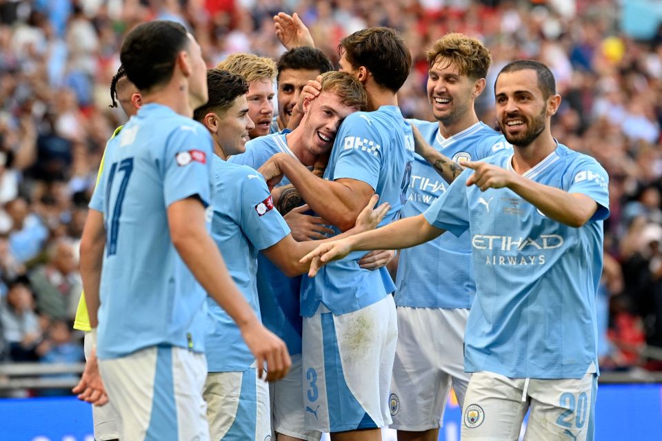 Sub Palmer is mobbed by Man City after his glorious strike