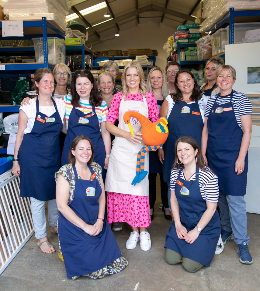 Charlotte met with the bank's volunteers - and mascot Stripey the stork