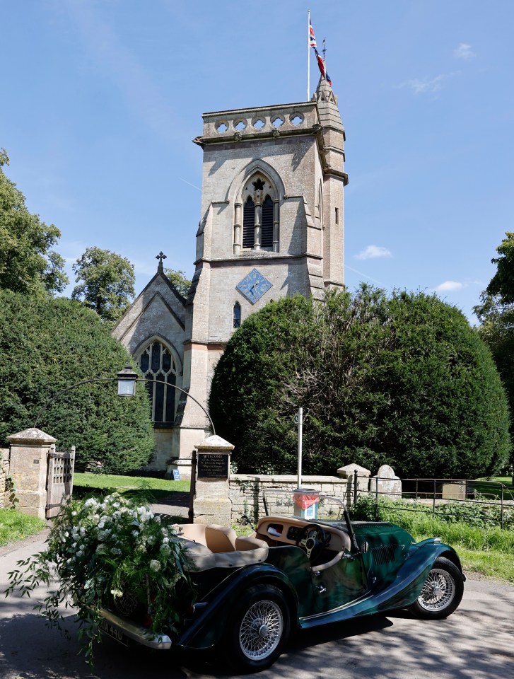 The classic car was sat outside the church to whisk them away