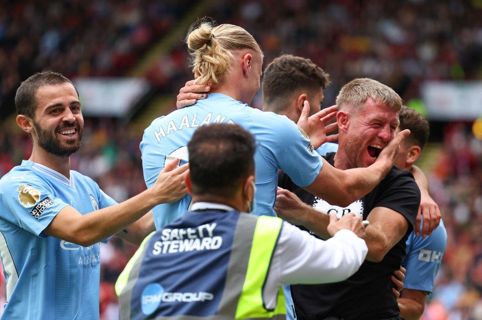 Flanagan looked delighted as security rushed in