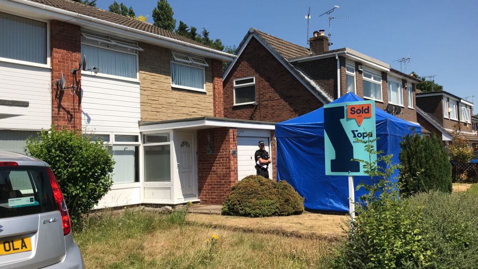 Officers outside Lucy's home