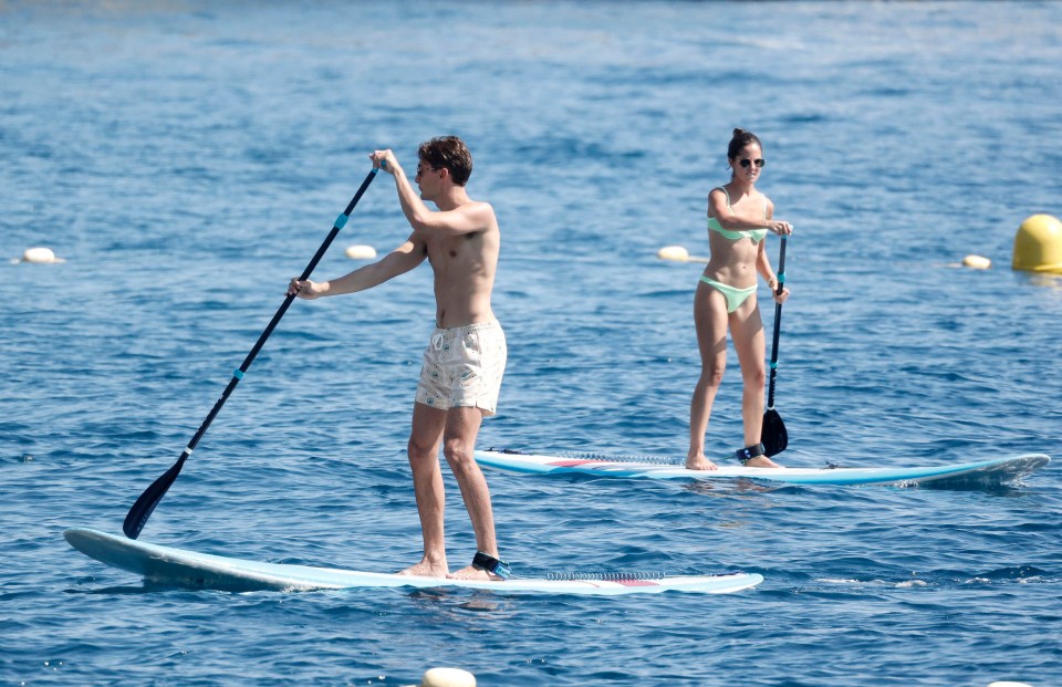 The sporty pair had a go at paddleboarding