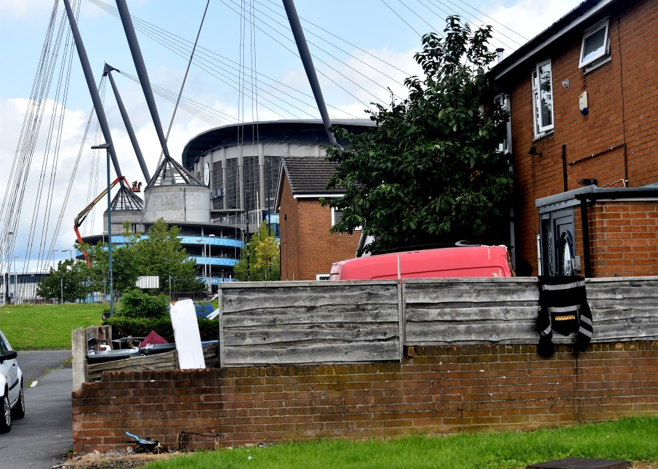 The 'neglected' Grey Mare estate borders the multi-million-pound Etihad Stadium