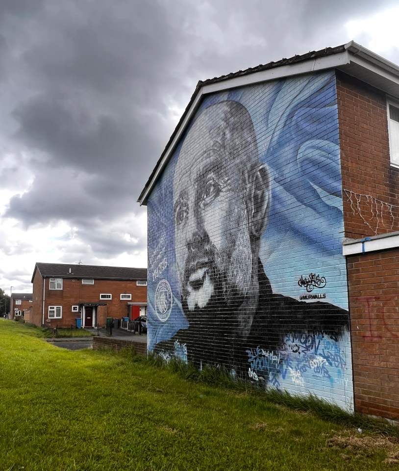 One home features a mural depicting Manchester City manager Pep Guardiola