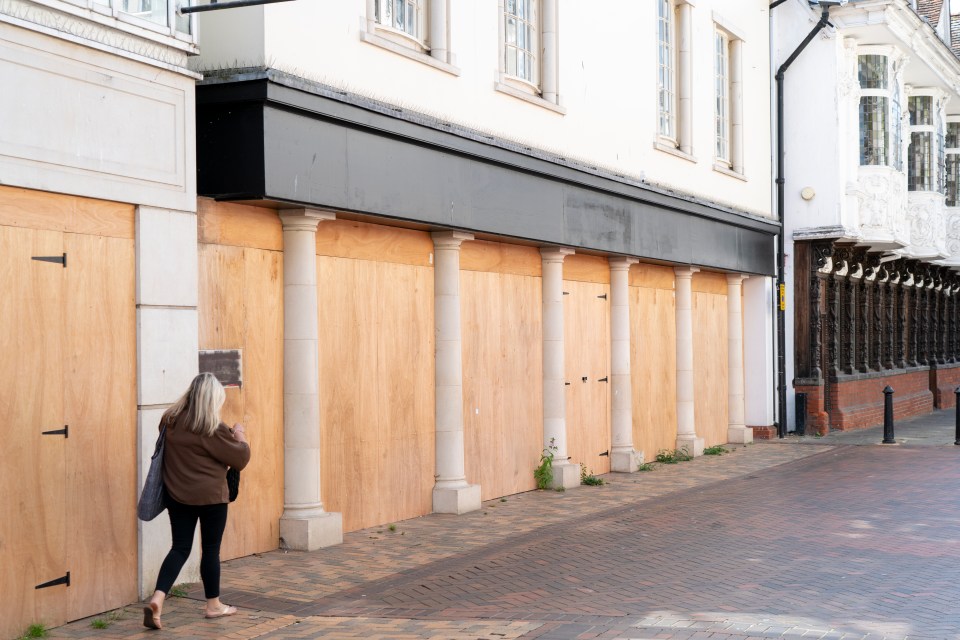 Empty shops line the streets as many businesses have been forced to shut