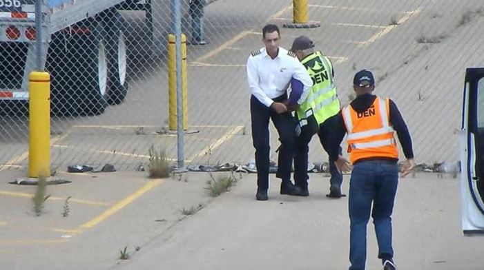 Parking lot employee Rick Stephens was seen trying to disarm the pilot