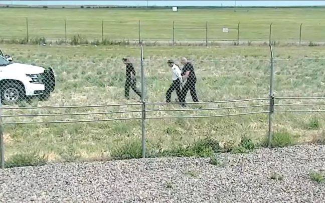 Jones was taken apprehended by Denver police in a nearby field