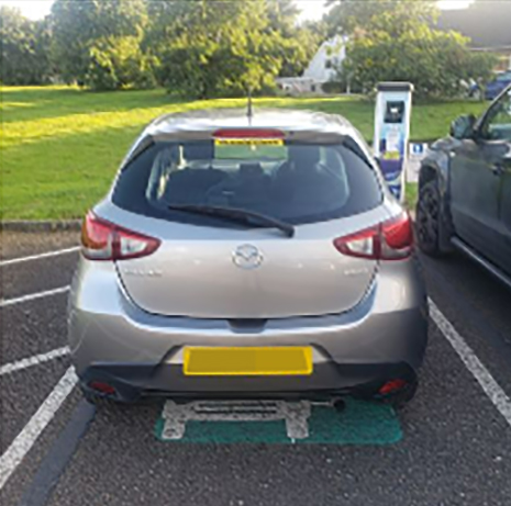 The driver was inconvenienced by the 'selfish' parking and had to find another charging station