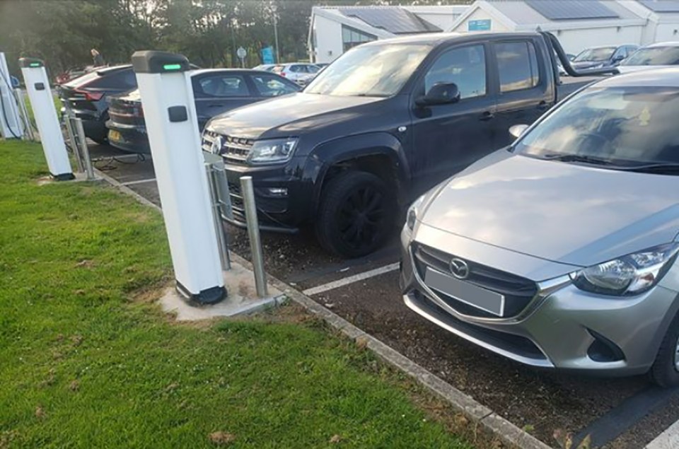 Two cars petrol cars were abandoned in the electric charging bays