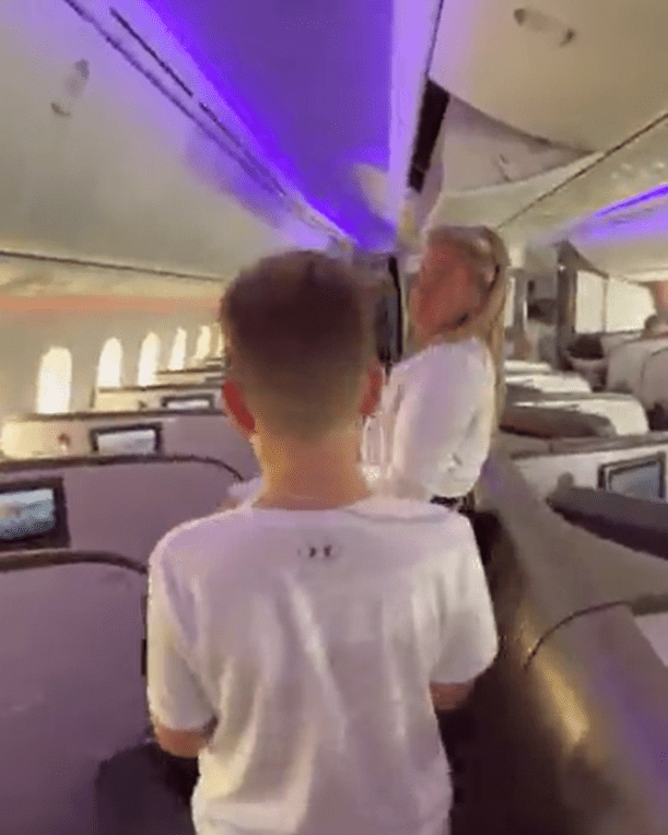 He shared footage of the family making their way through the plane