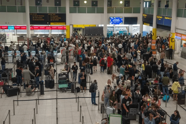 Holidaymakers waiting for updates on their flights at Gatwick