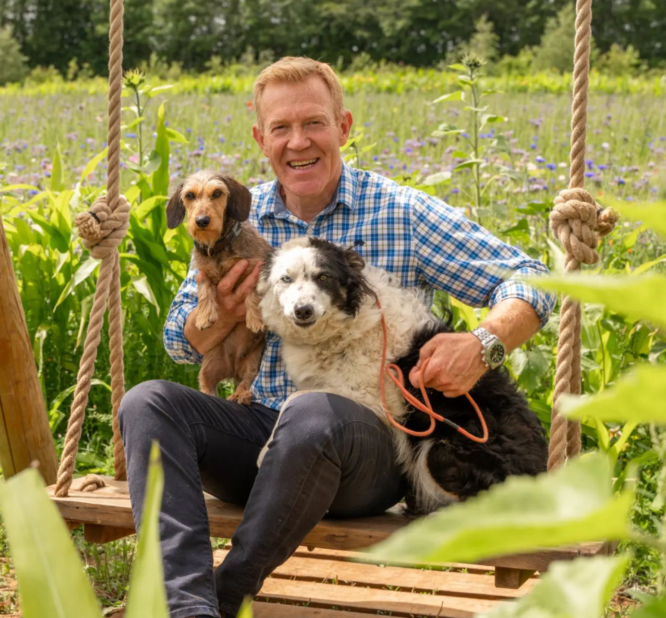 Adam looked 'picture perfect' posed outside with his two dogs