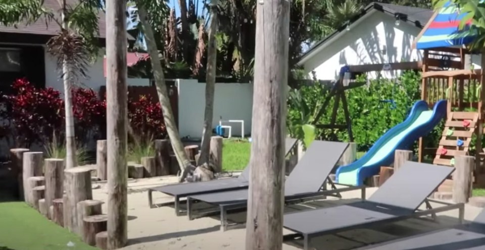 There's a miniature beach and a swing set for the little ones