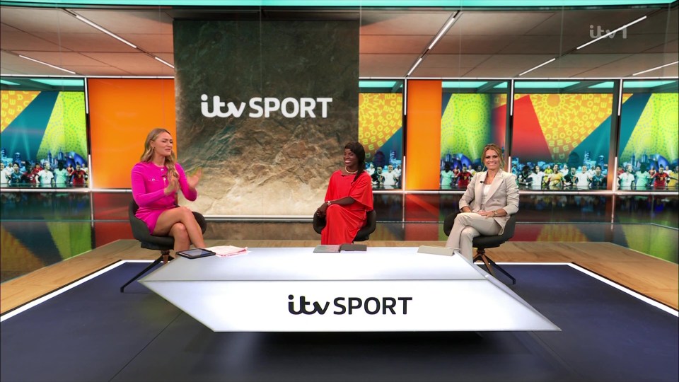 three women sit at a table in front of a wall that says itv sport