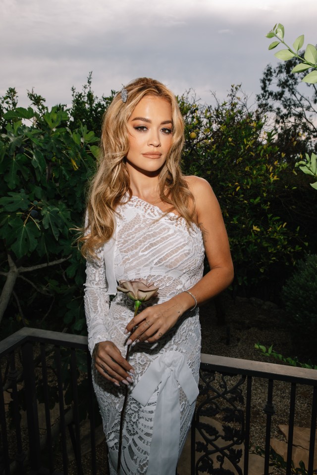 Rita oozed elegant bride vibes in her Tom Ford gown