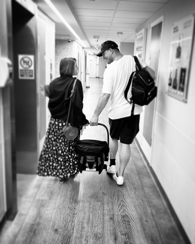 The couple shared a sweet photo leaving the hospital with their baby daughter