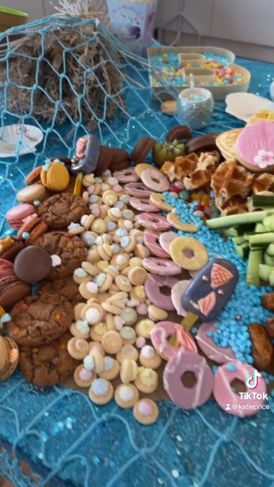 A selection of party snacks were laid out on a sea-themed table