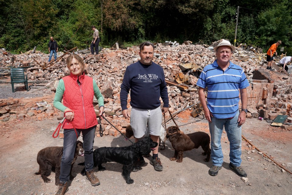 Locals Paul Craig and his wife Dawn have their own theories about the blaze, pictured with Paul Burden