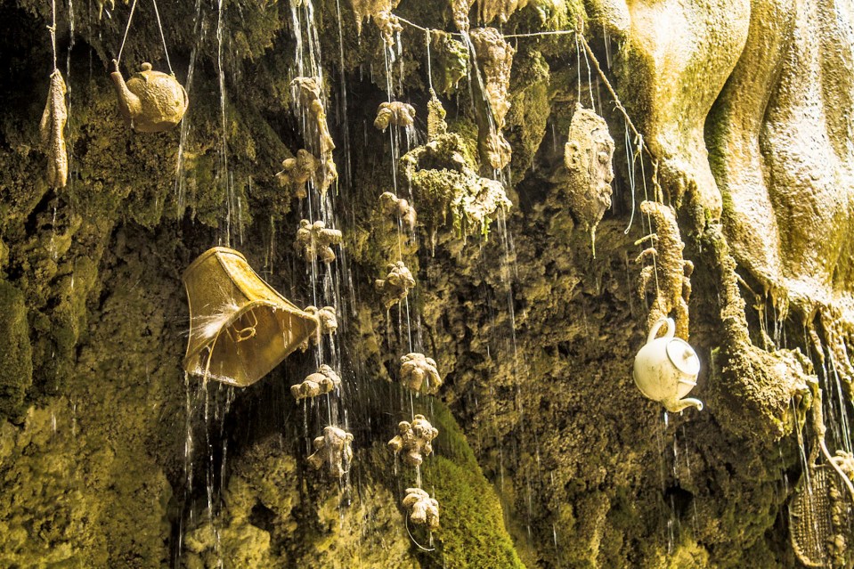 The petrified objects can be seen dangling from the well