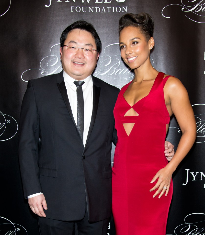 The wannabe playboy was pictured at a charity ball in New York posing with singer Alicia Keys.