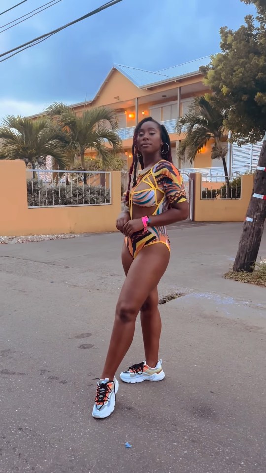 She wowed fans as she posed in a colourful swimsuit and matching trainers