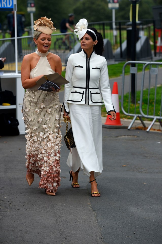 Many Ebor Festival guests were inspired by floral themes, such as this elegant attendee (left)