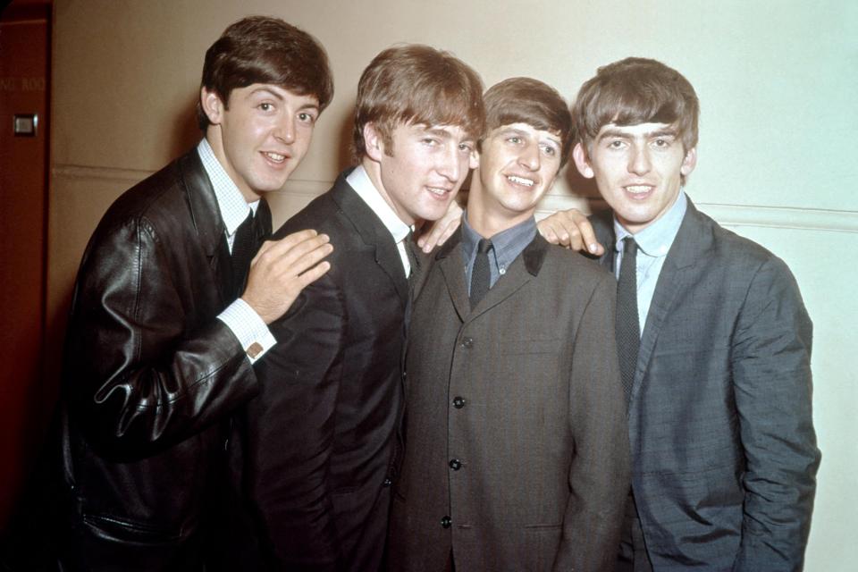 The Beatles - pictured together in 1963 - made a total of 12 albums