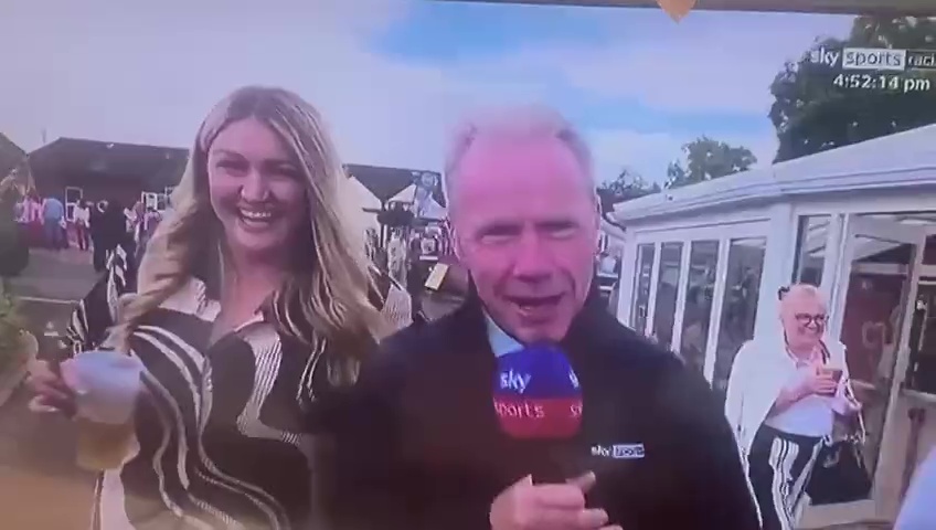 The happy punter caused mischief as Mick Fitzgerald attempted to present on Sky Sports