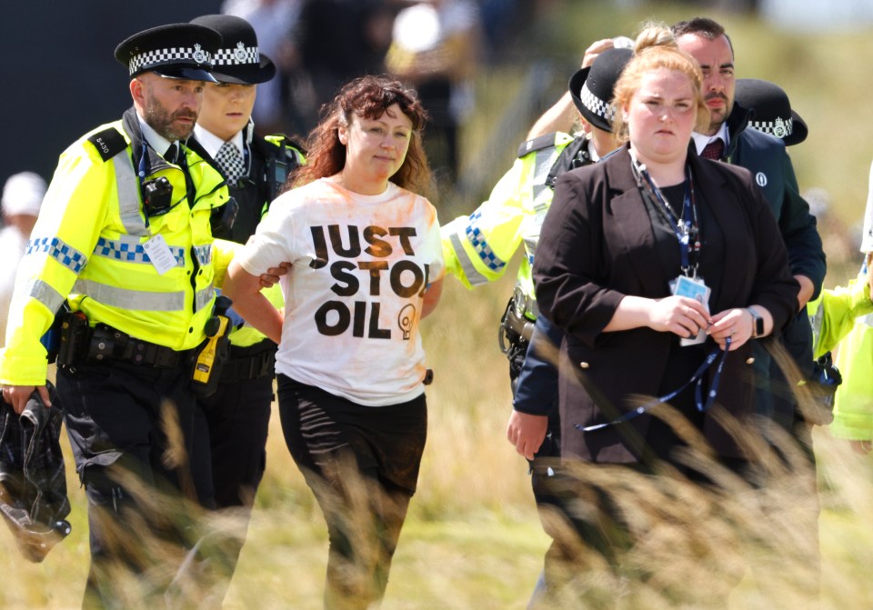 Police escorted a protestor away at The Open last month after the prestigious golf tournament was targeted