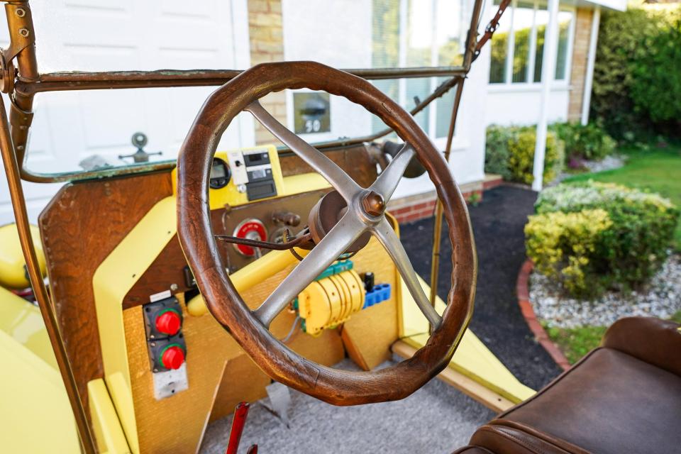 The iconic four-spoke steering wheel and interior remains pristine