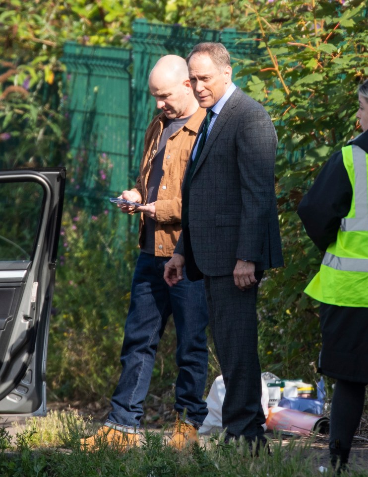 Actors Todd Boyce and Joe Duttine take a break from filming the killer scenes