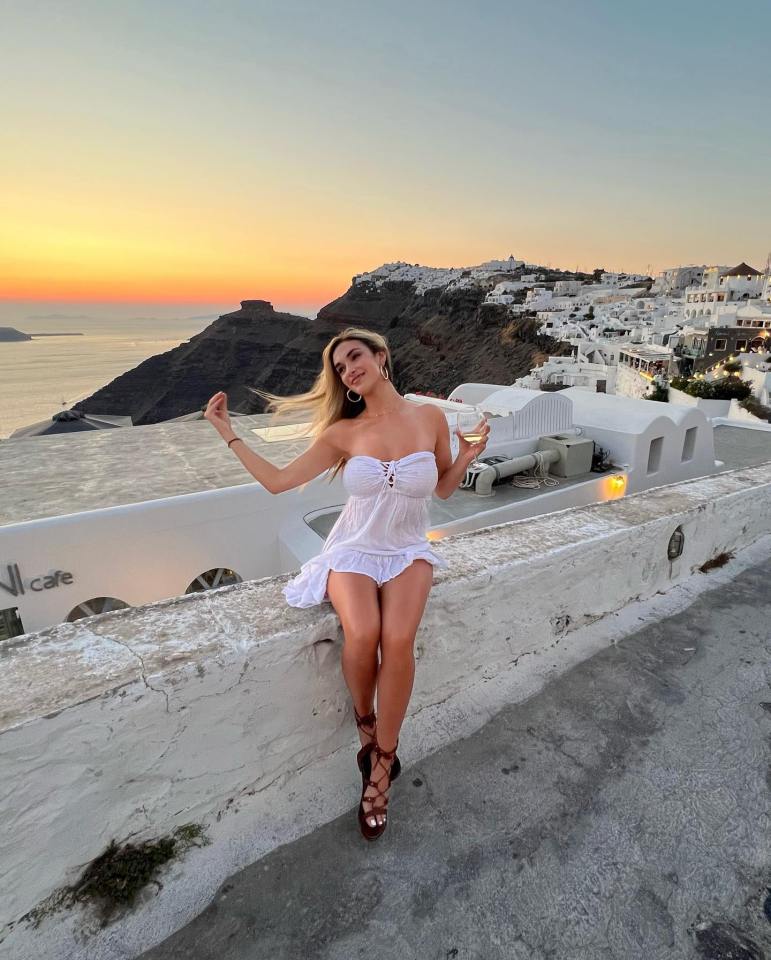 The influencer has been sunning it up in Santorini