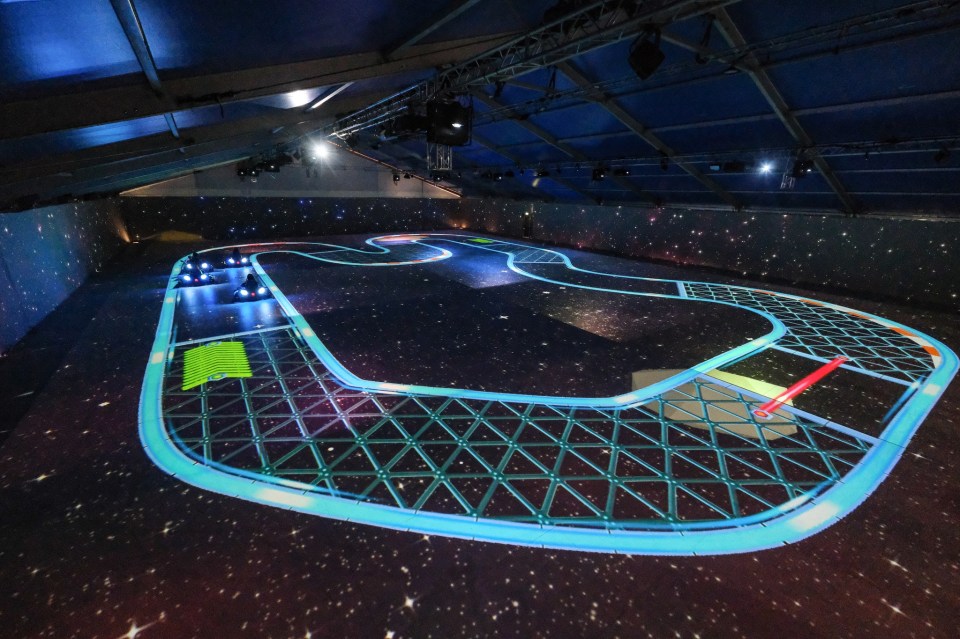 Racers will drive around a selection of different tracks projected on the ground