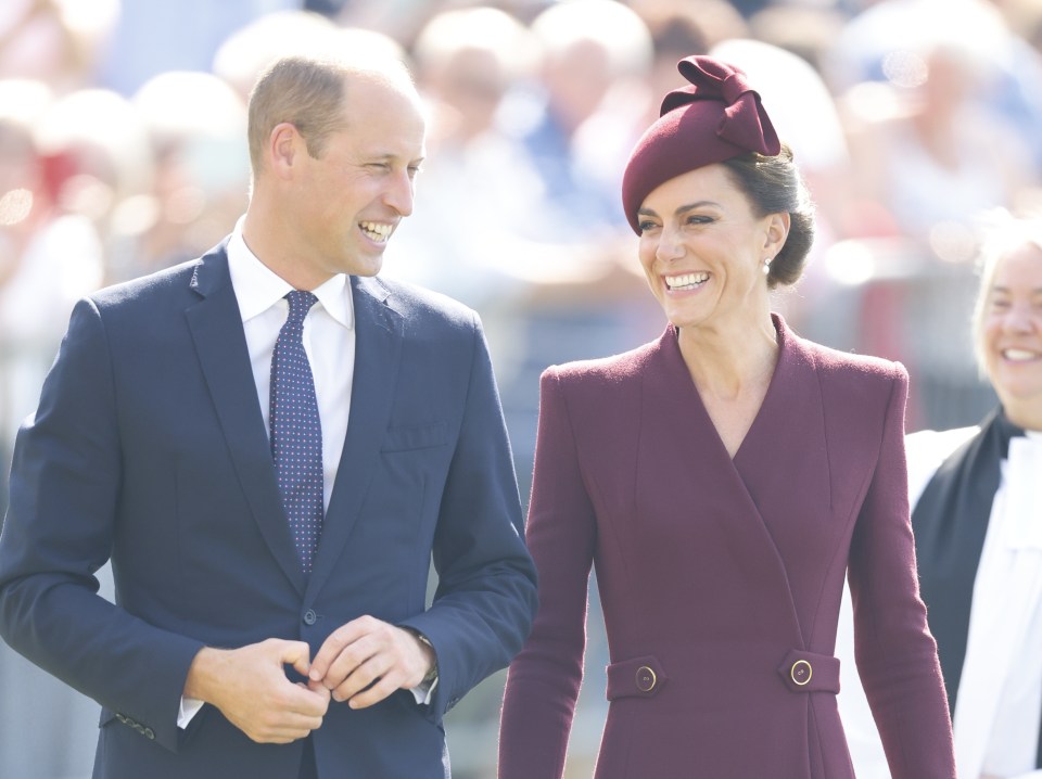 The couple smiled and waved at well-wishers