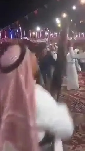 The wedding guest fires celebratory shots into the air