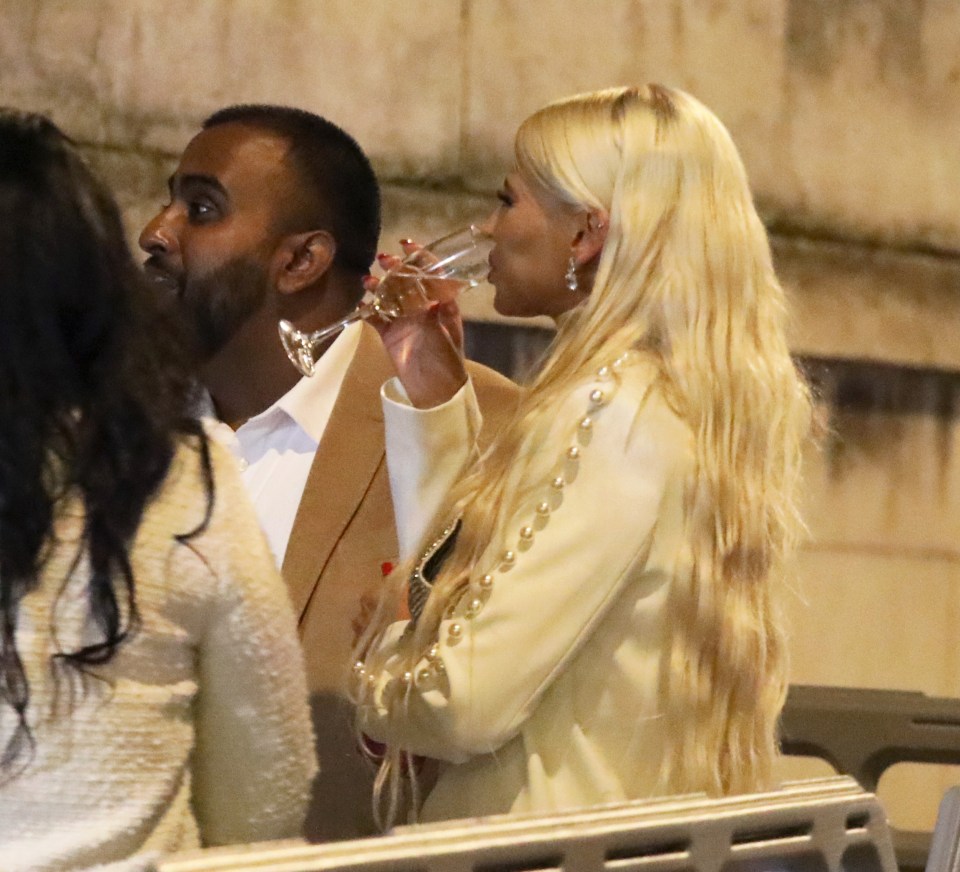 The actress was seen sipping on champers