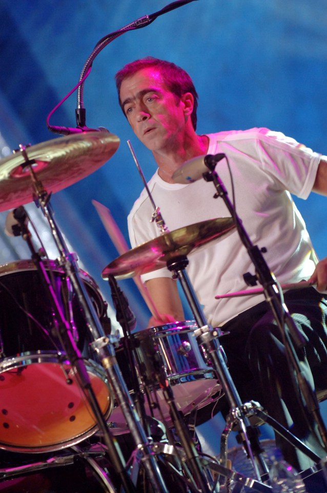 Drummer Bill Berry retired from performing after he collapsed on stage during a performance in Switzerland