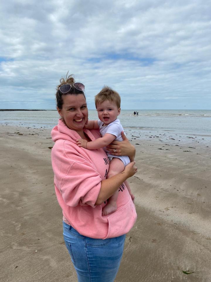 Swimming teacher Zoe Steeper with her baby son Oliver before his death