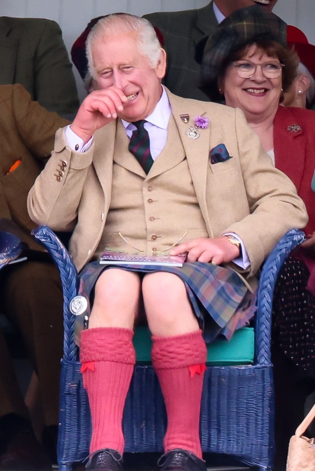 King Charles appeared in high spirits as he showed off his new tartan, designed by the Scottish Tartans Authority earlier this year to mark the coronation