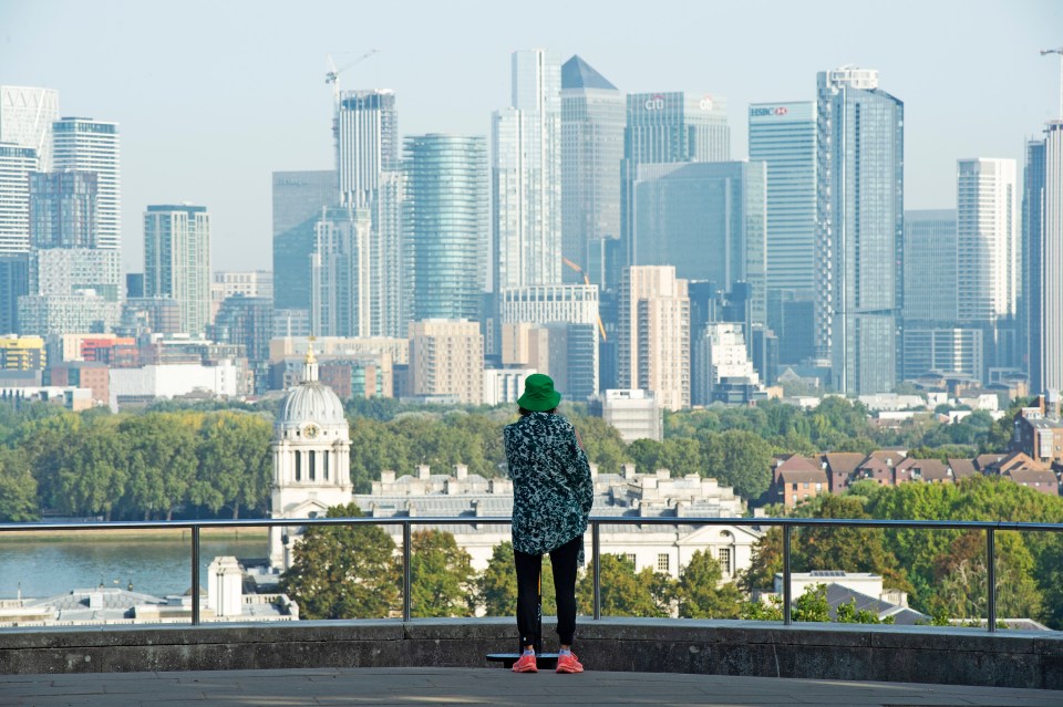 A morning view across Canary Wharf from Greenwich Park, London