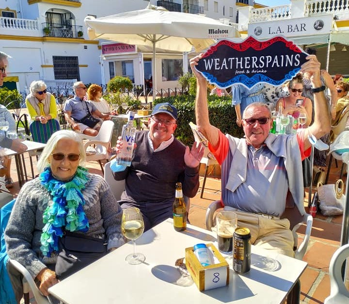 Punters enjoy Spoons-priced beers in the Spanish sun