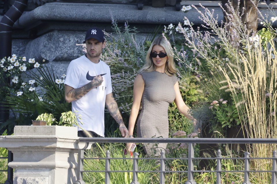 Liam with girlfriend Kate Cassidy at Lake Como in Italy just hours before he fell ill and was rushed to hospital